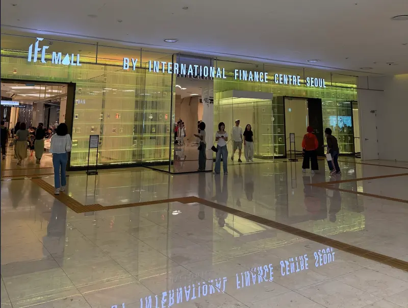 You pass this IFC mall entrance on your left partway along. It is not the stop, keep going to The Hyundai.